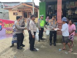 Polsek Kuala Gelar Jumat Berkah, Bagikan Nasi Bungkus untuk Warga Terdampak Banjir
