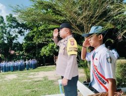 Bhabinkamtibmas Pimpin Upacara Bendera di SMA Negeri 5 Pujud Pujud