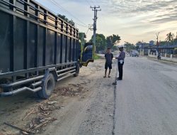 Polsek Pujud Laksanakan Strong Point Pagi, Amankan Aktivitas Masyarakat di Jalan Lintas Pujud–Tanjung Medan