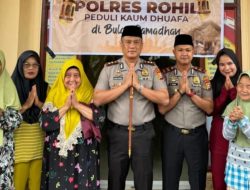 KAPOLRES ROKAN HILIR BAGIKAN SEMBAKO UNTUK KAUM DHUAFA DI KECAMATAN BATU HAMPAR