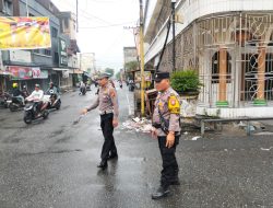 Polres Rohil laksanakan kegiatan Strong Point Meski Hujan Deras, Personil Tetap Tegap Jaga Titik titik keramaian Demi Rasa Aman Warga